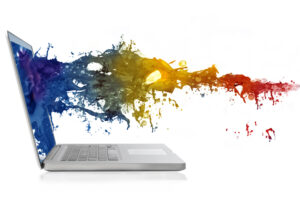 forma abstrata e colorida saindo da tela de um computador para representar criatividade